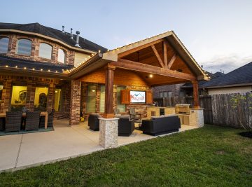 gabled patio with outdoor entertainment center
